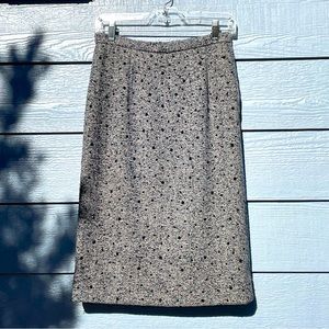 Wool tweed skirt w/scattered black rhinestones all over. Sz 26